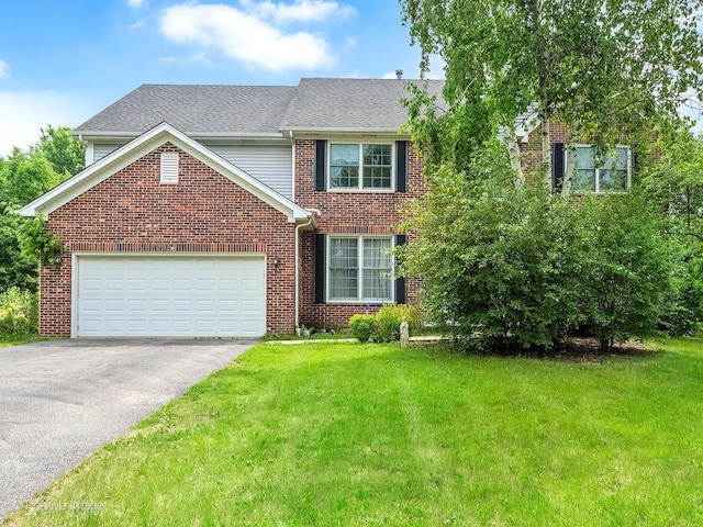 1465 Teal Ct, Hoffman Estates, IL 60192 - view of front of house featuring an attached garage, driveway, a front lawn, and brick siding