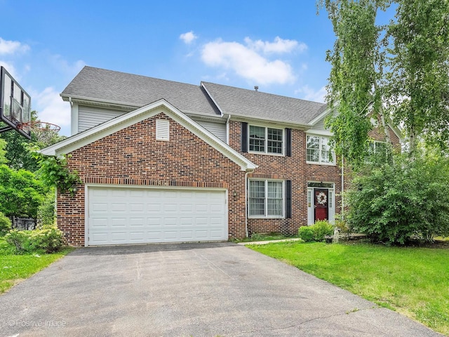 1465 Teal Ct, Hoffman Estates, IL 60192 - view of front of house featuring asphalt driveway, brick siding, and a garage