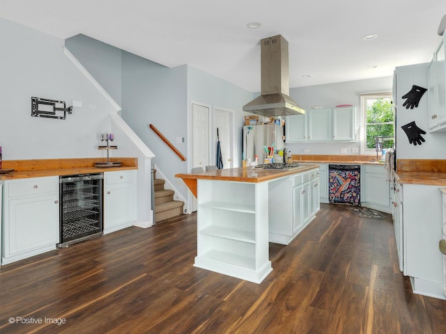 1465 Teal Ct, Hoffman Estates, IL 60192 - kitchen featuring wine cooler, island exhaust hood, black dishwasher, wood counters, and recessed lighting