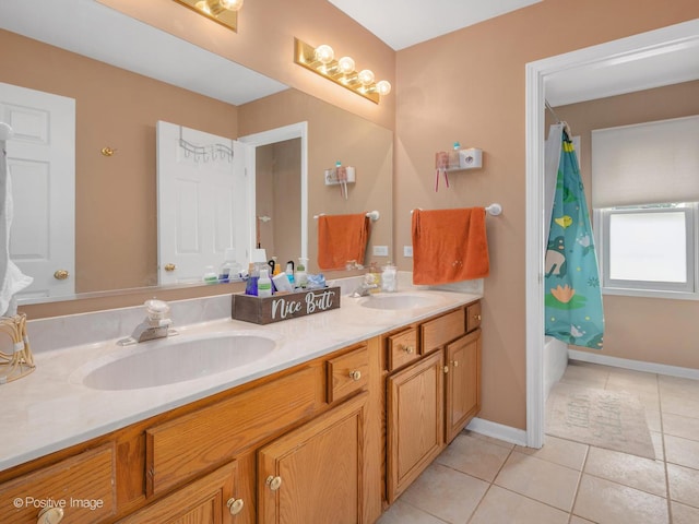 1465 Teal Ct, Hoffman Estates, IL 60192 - full bathroom featuring double vanity, tile patterned floors, and shower / bath combo with shower curtain