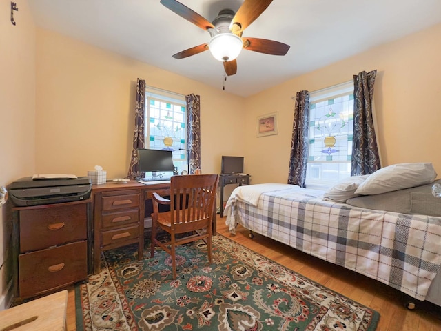 505 S Oakland Ave, Villa Park, IL 60181 - bedroom with wood finished floors, an office area, and a ceiling fan