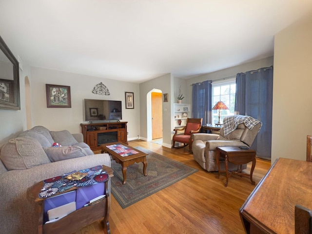 505 S Oakland Ave, Villa Park, IL 60181 - living room featuring arched walkways and wood finished floors
