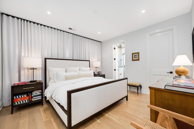 1719 N Burling St Unit 2S, Chicago, IL 60614 - bedroom with light wood-type flooring, recessed lighting, and baseboards