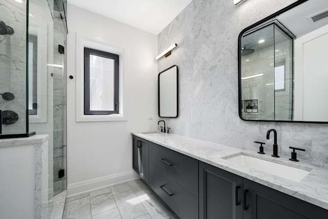 1719 N Burling St Unit 2S, Chicago, IL 60614 - bathroom featuring a stall shower, baseboards, and marble finish flooring