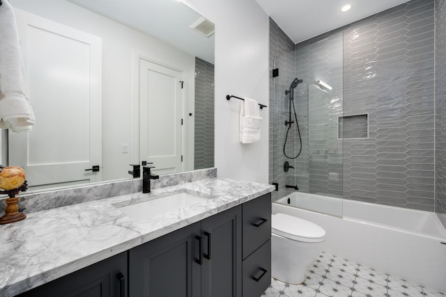 1719 N Burling St Unit 2S, Chicago, IL 60614 - bathroom featuring shower / bath combination, vanity, toilet, recessed lighting, and tile patterned floors