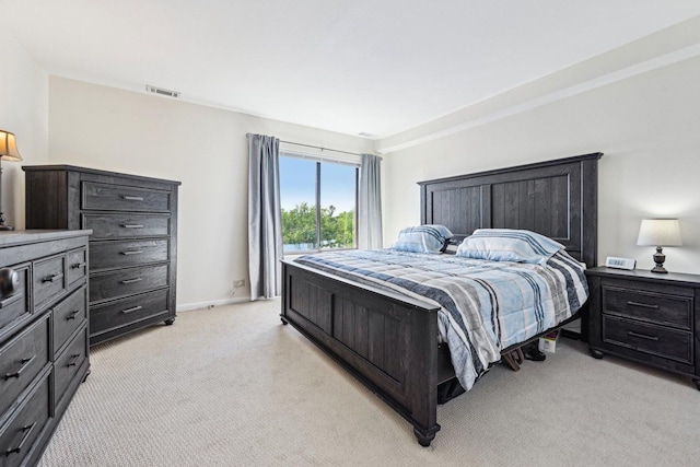 950 E Wilmette Rd Unit 410, Palatine, IL 60067 - bedroom with light carpet and baseboards
