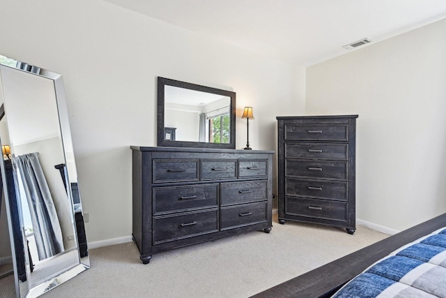 950 E Wilmette Rd Unit 410, Palatine, IL 60067 - bedroom featuring light carpet and baseboards