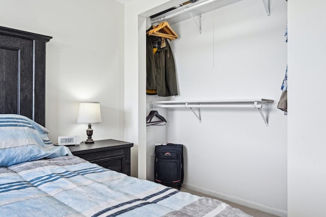 950 E Wilmette Rd Unit 410, Palatine, IL 60067 - bedroom featuring baseboards and carpet flooring