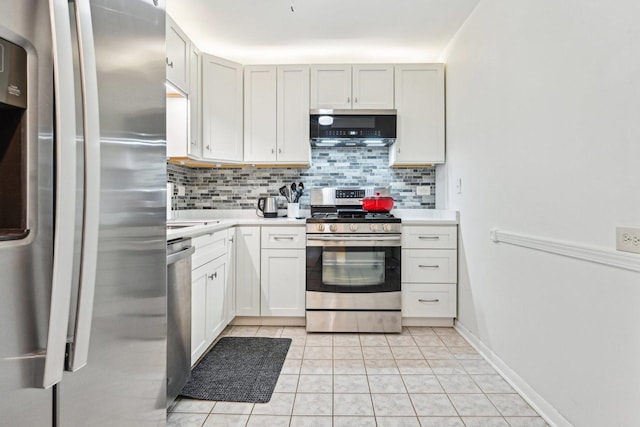 950 E Wilmette Rd Unit 410, Palatine, IL 60067 - kitchen with appliances with stainless steel finishes, decorative backsplash, light countertops, and light tile patterned floors