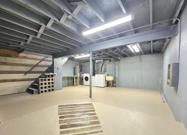 1S155 Danby St, Villa Park, IL 60181 - unfinished below grade area featuring washing machine and dryer, a sink, stairway, gas water heater, and electric panel