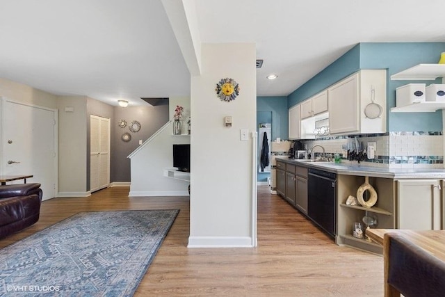 1S155 Danby St, Villa Park, IL 60181 - kitchen featuring dishwasher, open shelves, tasteful backsplash, light wood finished floors, and baseboards
