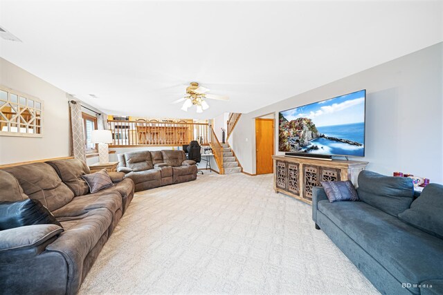 9039 S Central Ave, Oak Lawn, IL 60453 - living room featuring stairway, a ceiling fan, and light colored carpet