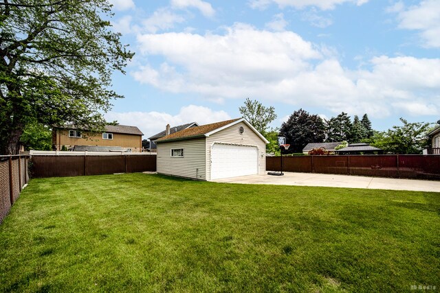 9039 S Central Ave, Oak Lawn, IL 60453 - view of yard with an outdoor structure, a patio area, and a garage