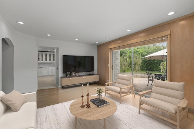 1682 Cavell Ave, Highland Park, IL 60035 - living area featuring wood finished floors, arched walkways, recessed lighting, and baseboards