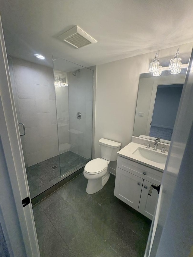 154 Pine Ln, Wood Dale, IL 60191 - full bathroom featuring a shower stall, vanity, toilet, and a chandelier