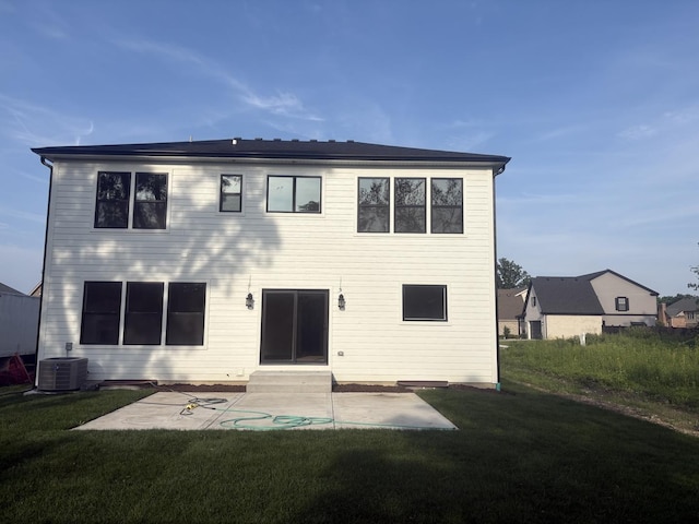 154 Pine Ln, Wood Dale, IL 60191 - back of house featuring a patio area and a yard