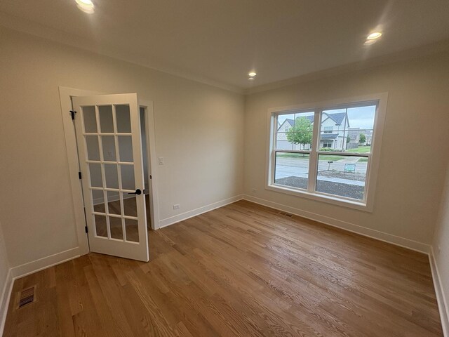 154 Pine Ln, Wood Dale, IL 60191 - spare room with wood finished floors, baseboards, and recessed lighting