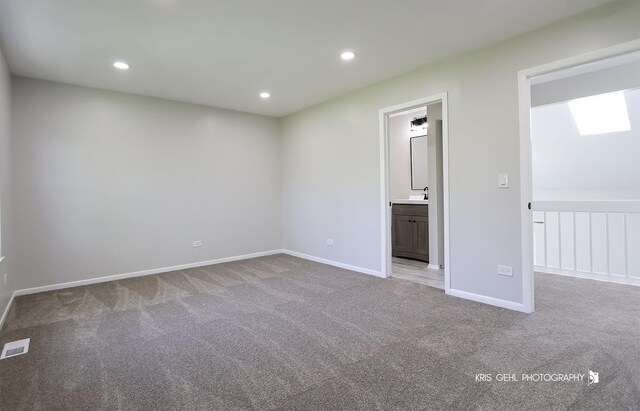 3412 Greenwich Ln, Island Lake, IL 60042 - unfurnished bedroom with carpet flooring, baseboards, recessed lighting, ensuite bathroom, and a sink