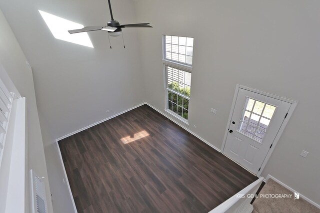 3412 Greenwich Ln, Island Lake, IL 60042 - entryway featuring a towering ceiling, healthy amount of natural light, baseboards, ceiling fan, and dark wood finished floors