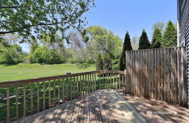 3412 Greenwich Ln, Island Lake, IL 60042 - wooden terrace featuring a lawn and view of scattered trees