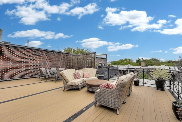 1201 W Wrightwood Ave Unit 22, Chicago, IL 60614 - wooden terrace with outdoor lounge area