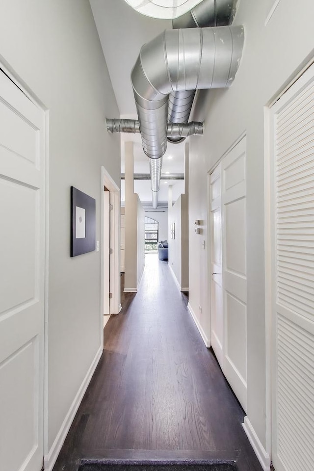 1201 W Wrightwood Ave Unit 22, Chicago, IL 60614 - corridor with dark wood-type flooring and baseboards