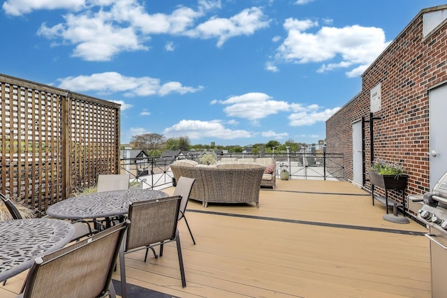 1201 W Wrightwood Ave Unit 22, Chicago, IL 60614 - wooden terrace with outdoor dining space
