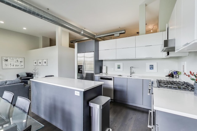 1201 W Wrightwood Ave Unit 22, Chicago, IL 60614 - kitchen with appliances with stainless steel finishes, a sink, dark wood-type flooring, light countertops, and recessed lighting