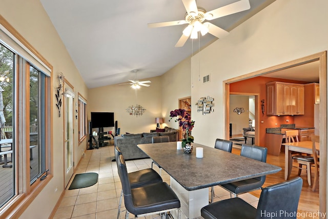 209 S Emerald Dr, Mchenry, IL 60051 - dining area featuring a ceiling fan, light tile patterned floors, high vaulted ceiling, and baseboards