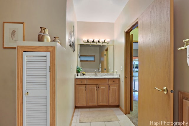 209 S Emerald Dr, Mchenry, IL 60051 - bathroom with tile patterned flooring, vanity, and baseboards