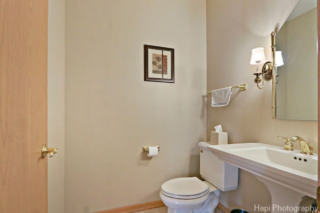 209 S Emerald Dr, Mchenry, IL 60051 - half bathroom with toilet and baseboards