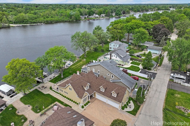 209 S Emerald Dr, Mchenry, IL 60051 - aerial overview of property's location with a nearby body of water, nearby suburban area, and a heavily wooded area