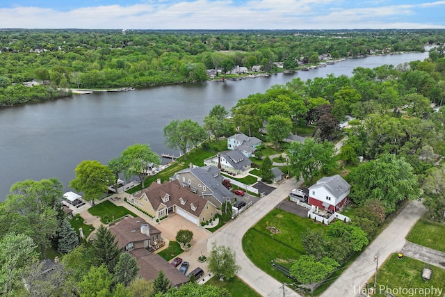 209 S Emerald Dr, Mchenry, IL 60051 - view of property location with a nearby body of water, nearby suburban area, and a heavily wooded area
