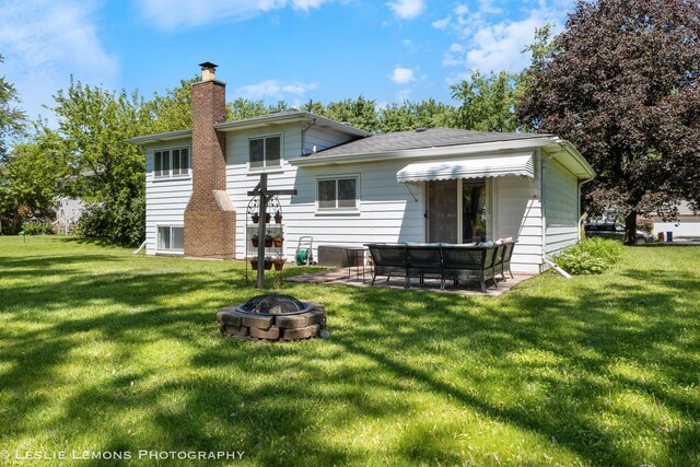 1260 Kent Ct, Wheaton, IL 60189 - rear view of house featuring an outdoor fire pit, a yard, a chimney, and a patio area