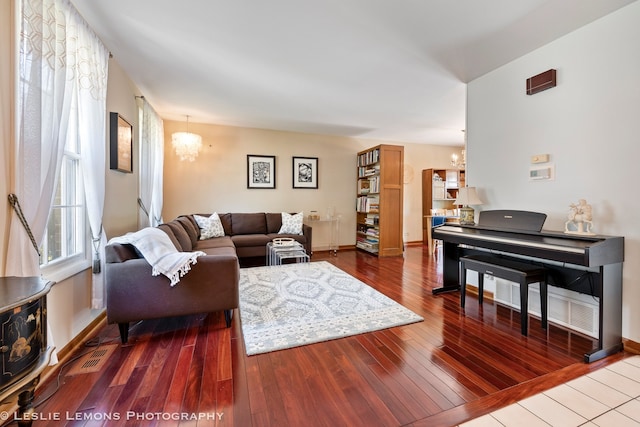 1260 Kent Ct, Wheaton, IL 60189 - living room with a chandelier, wood-type flooring, and baseboards