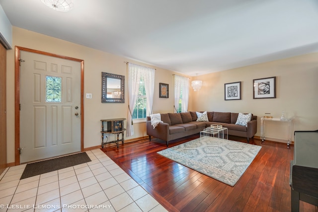 1260 Kent Ct, Wheaton, IL 60189 - living room with wood-type flooring, baseboards, and a chandelier