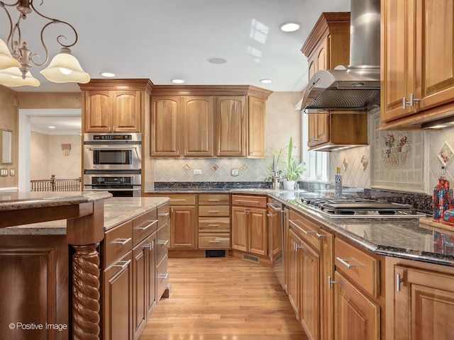6 Swaps Ct, Oak Brook, IL 60523 - kitchen featuring ventilation hood, appliances with stainless steel finishes, light wood finished floors, dark stone counters, and decorative backsplash