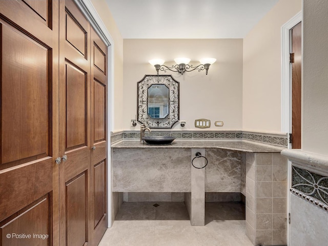 6 Swaps Ct, Oak Brook, IL 60523 - bathroom featuring tile patterned floors and a wainscoted wall
