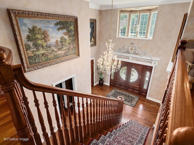 6 Swaps Ct, Oak Brook, IL 60523 - entrance foyer with stairway, wood finished floors, crown molding, and a chandelier