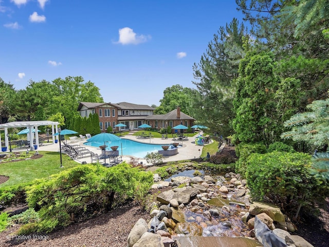 6 Swaps Ct, Oak Brook, IL 60523 - swimming pool with a pergola, a patio, and a lawn