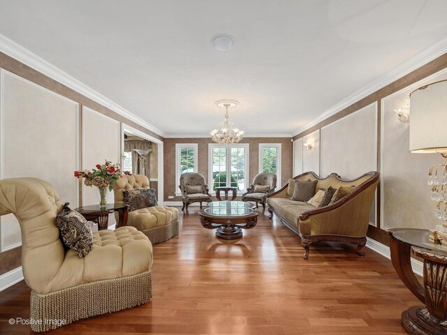 6 Swaps Ct, Oak Brook, IL 60523 - living room featuring a chandelier, crown molding, and wood finished floors