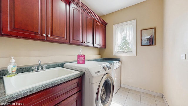 17040 Cheyenne Ct, Lockport, IL 60441 - laundry room with washing machine and dryer, cabinet space, baseboards, and light tile patterned floors
