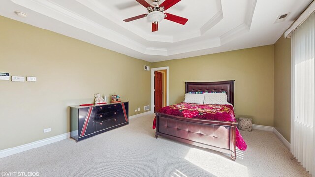 17040 Cheyenne Ct, Lockport, IL 60441 - bedroom featuring carpet floors, a tray ceiling, crown molding, a ceiling fan, and baseboards