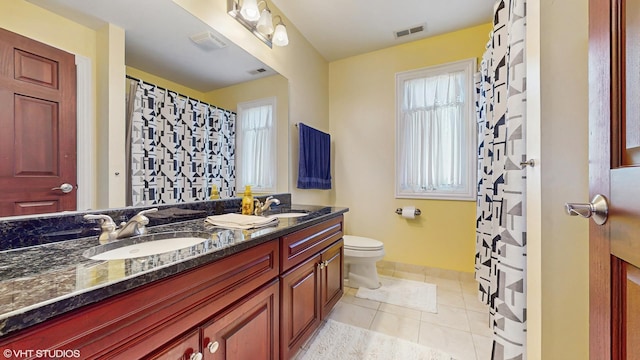 17040 Cheyenne Ct, Lockport, IL 60441 - bathroom with toilet, double vanity, tile patterned flooring, and curtained shower