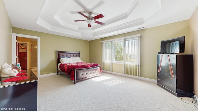 17040 Cheyenne Ct, Lockport, IL 60441 - carpeted bedroom featuring crown molding, a tray ceiling, baseboards, and ceiling fan