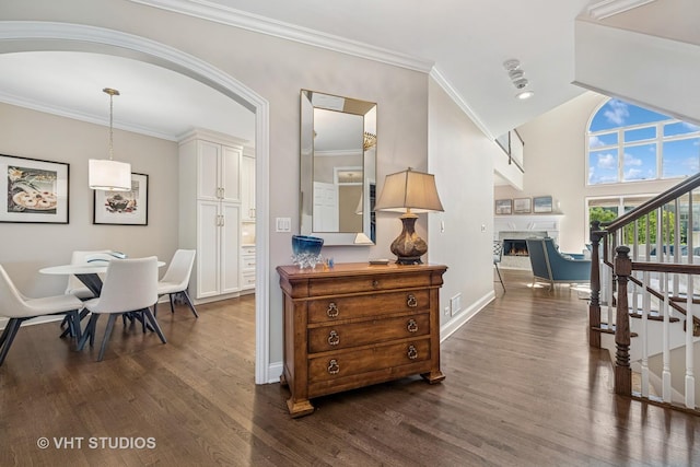 1559 S Paul Le Comte Ct, Palatine, IL 60067 - hall featuring dark wood finished floors, stairway, arched walkways, baseboards, and ornamental molding