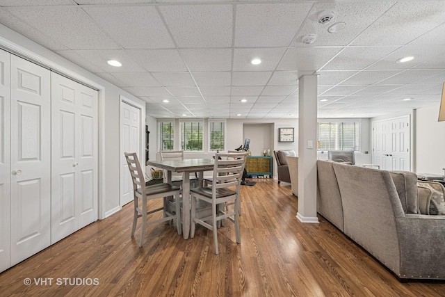 1559 S Paul Le Comte Ct, Palatine, IL 60067 - dining room featuring wood finished floors, a paneled ceiling, recessed lighting, and baseboards