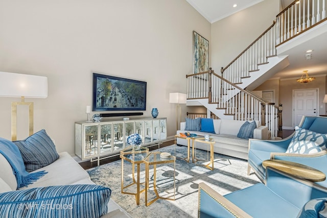 1559 S Paul Le Comte Ct, Palatine, IL 60067 - living area featuring crown molding, stairs, a high ceiling, wood finished floors, and baseboards