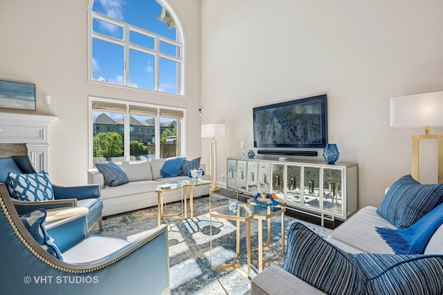 1559 S Paul Le Comte Ct, Palatine, IL 60067 - living area with a towering ceiling and a fireplace