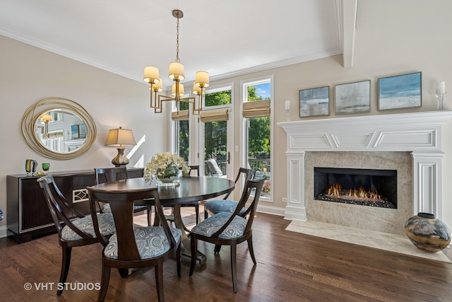 1559 S Paul Le Comte Ct, Palatine, IL 60067 - dining space featuring dark wood-type flooring, a chandelier, crown molding, a high end fireplace, and baseboards